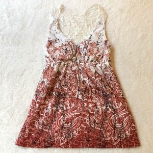 Sleeveless Babydoll Top with Crochet Neckline